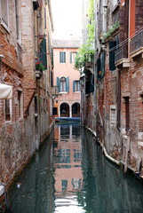 Fototapeta na wymiar Venice urban architecture with canals and bay