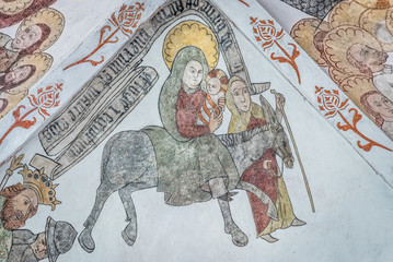 Flight into Egypt, the holy family running from Herod, an ancient mural
