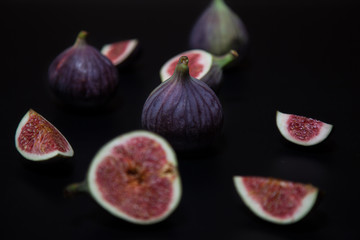 Ripe figs on a dark background