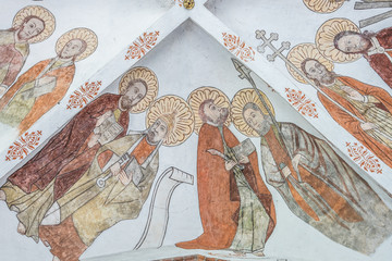 Mural of four apostles with their symbols, Matthew, Peter, Bartholomew, Thomas