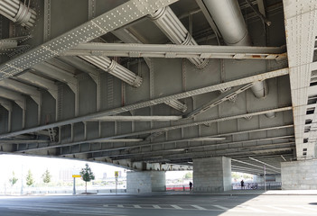 Construction of an automobile bridge over a river in Moscow. Bottom view