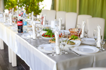 Festive table for guests in the restaurant