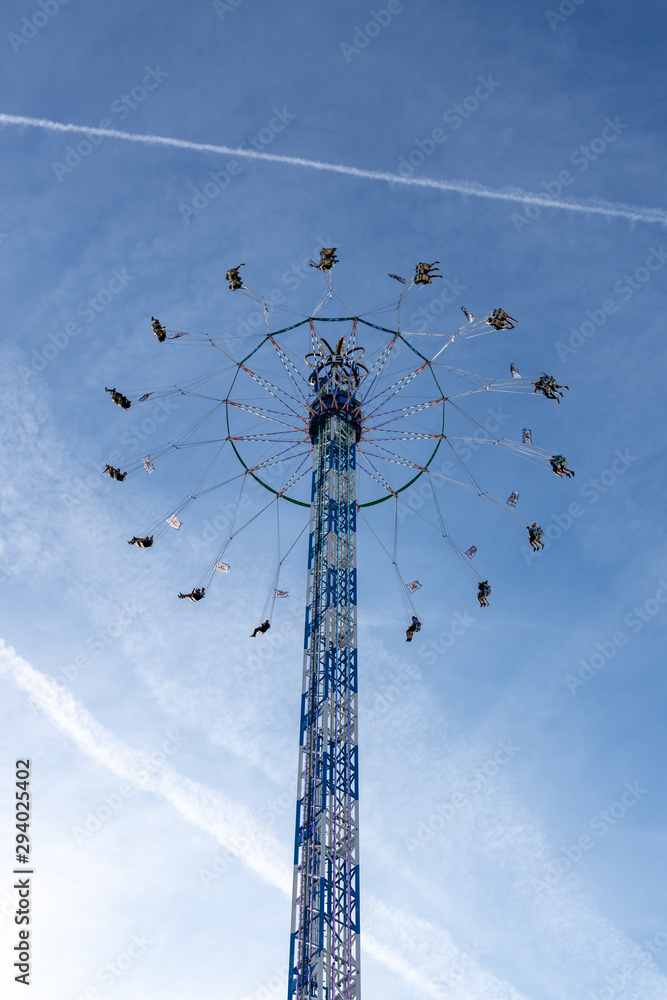 Wall mural Munich, Germany - 2019, September 19: people on a tallest kettenkarussell at the biggest folk festival in the world - the oktoberfest