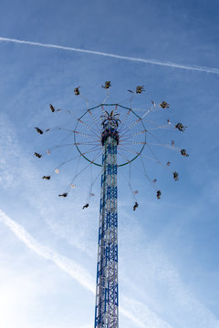 Munich, Germany - 2019, September 19: people on a tallest kettenkarussell at the biggest folk festival in the world - the oktoberfest