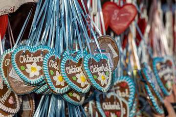 typical gingerbread hearts at the oktoberfest in munich 2019 with the word Oktoberfest on it