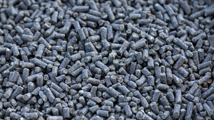 Chicken manure pellets or waste, organic fertilizer as background