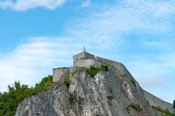 view of the historic citadel and fortress on the cliff above Dinant