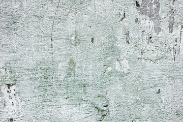 Texture of a concrete wall with cracks and scratches which can be used as a background