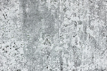 Texture of a concrete wall with cracks and scratches which can be used as a background