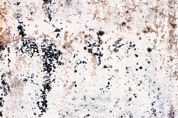 Texture of a concrete wall with cracks and scratches which can be used as a background