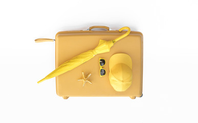 Yellow suitcase with traveler accessories isolated on white background, travel concept, minimal...