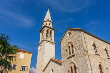 The tower of the temple in the historical part of the city of Budva in Montenegro.