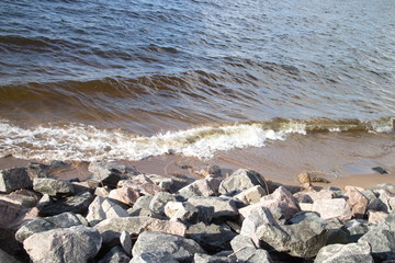 Waves near the shore close up on a sunny day