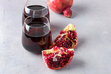 Two Glasses of Fresh Tasty Pomergranate Juice on Gray Background Diet Healthy Drink Detox Ripe...