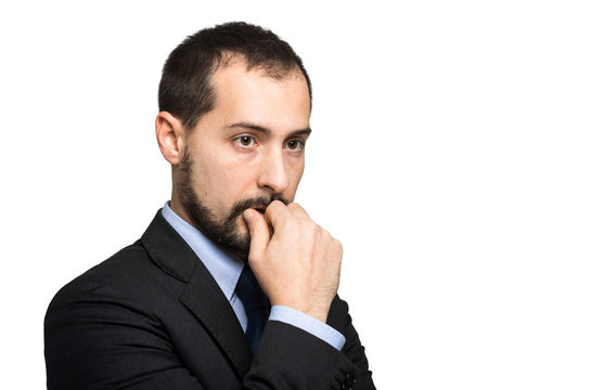 Young businessman in a thoughtful expression
