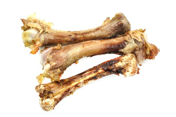 Small bones on a white background. food scraps. chicken bones
