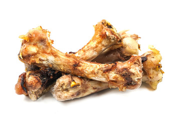 Small bones on a white background. food scraps. chicken bones