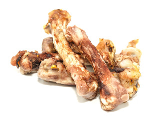 Small bones on a white background. food scraps. chicken bones