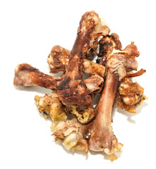 Small bones on a white background. food scraps. chicken bones