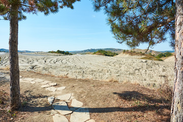 Muddy volcanoes Paclele Mari near Buzau, Romania. Mud and natural-gas eruptions create small volcanoes in natural reserve.