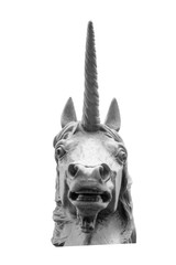 Ancient statue of legendary creature unicorn as a beast with a single large, pointed, spiraling horn