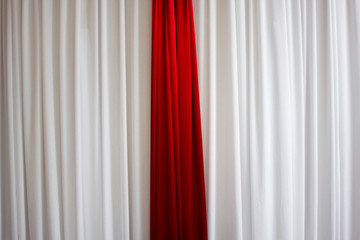 Red Curtain on a White Curtain Vertical