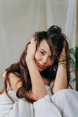 Naklejka premium Pretty young lady is posing on camera