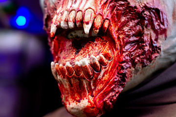 Bloody teeth on a halloween mask