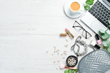 Women's cosmetic bag with lipstick, hair brush, face cream and eye shadow. Makeup.