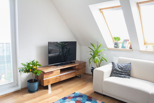 Loft Living Room With Wooden Tv Stand And White Sofa