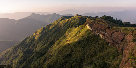 Fototapeta na wymiar The mighty ridges of the hills spread around the village of Reiek in Mizoram.