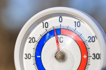 Outdoor thermometer shows subzero temperature - cold wave concept - obrazy, fototapety, plakaty