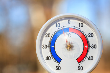 Outdoor thermometer shows subzero temperature - cold wave concept