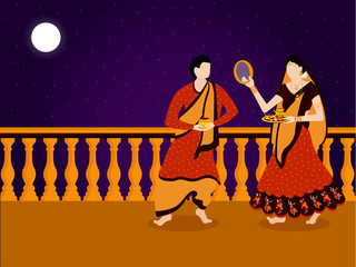 Night background on the terris view married man and women  celebrating karwa chauth.