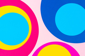 Texture background of fashion papers in memphis geometry style. Yellow, blue, pink colors. Top view, flat lay