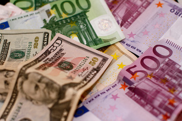 Dollar and Euro. Finance and Economy.   Five hundred Euro and Fifty Dollars. Trading in USA and Europe