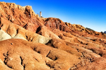 Sediments, rock formations and mineral streaks in an old abandoned quarry