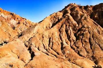 Sediments, rock formations and mineral streaks in an old abandoned quarry