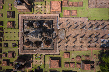 Aerial view of Ancient Buddha statue at Wat Mahathat temple in Sukhothai Historical Park, Thailand.