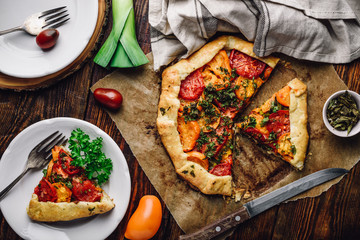 Sliced tomato galette on baking paper