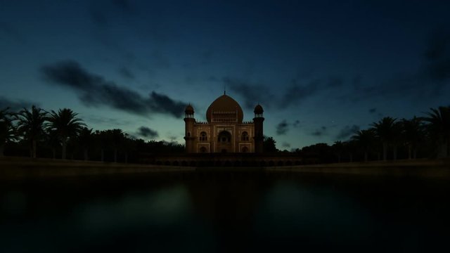 Tomb of Safdarjung, Delhi, India, against timelapse sunrise, zoom in