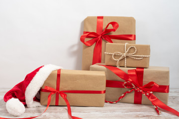 Gift box wrapped in recycled paper with ribbon bow