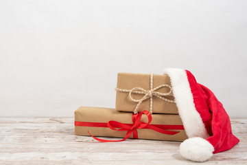 Gift box wrapped in recycled paper with ribbon bow