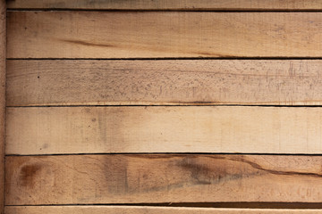 Background in the form of horizontal boards of light brown color