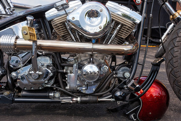 One of several motorcycles parked in the city