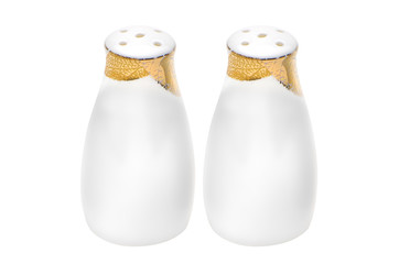 Fototapeta na wymiar White and golden salt shaker for kitchen and hotels