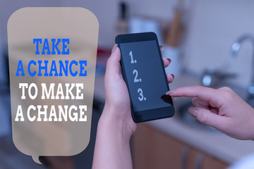 Writing note showing Take A Chance To Make A Change. Business concept for dont lose opportunity to reach bigger things woman using smartphone and technological devices inside the home