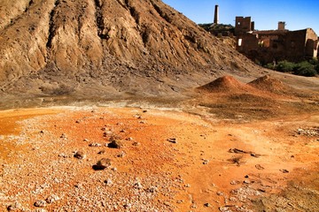 Sediments, rock formations and mineral streaks in an old abandoned quarry