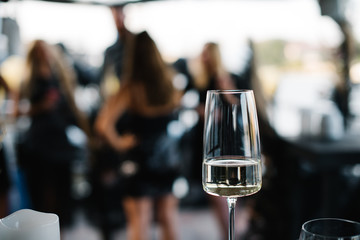 Glass of sparkling wine at a party