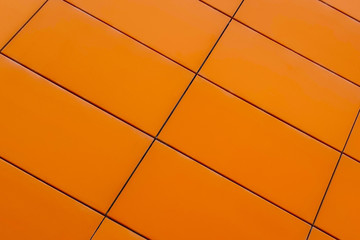 Background of orange tile. Texture.